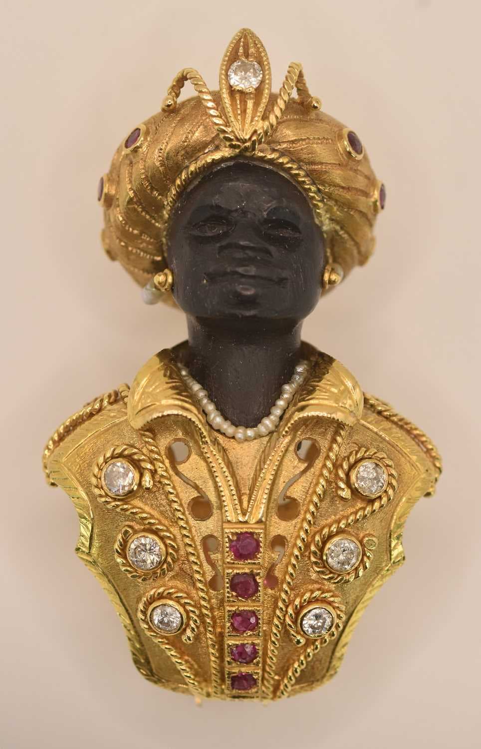 An 18ct yellow gold ruby and diamond set Blackamoor...
