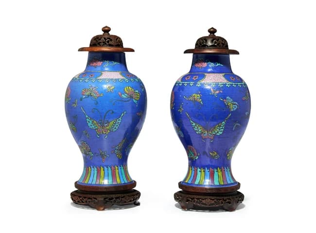 A pair of Chinese powder-blue famille rose 'butterfly' vases Qing dynasty
