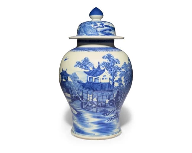 A large Chinese blue and white 'landscape' jar and cover...