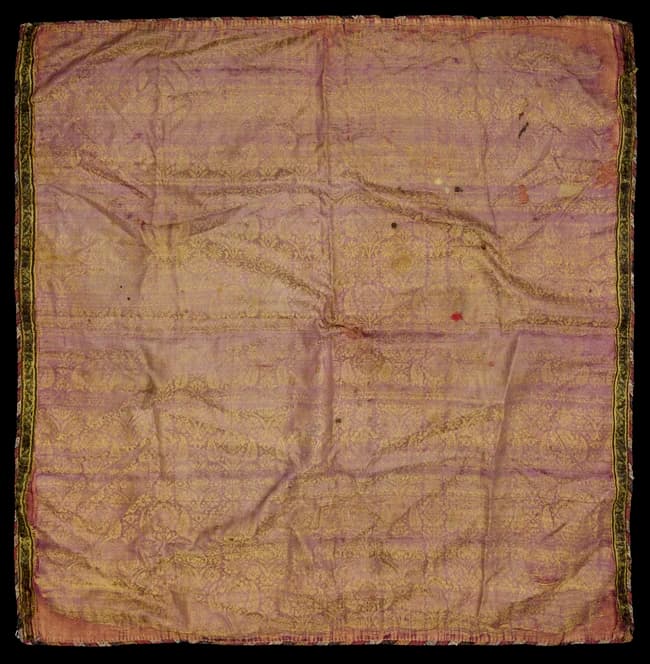 A wool and silk woven coverlet