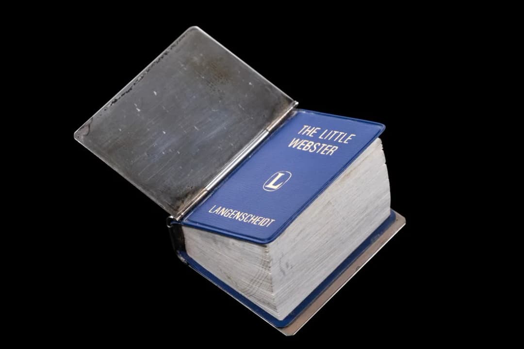 TIFFANY STERLING CASED MINIATURE WEBSTER DICTIONARY