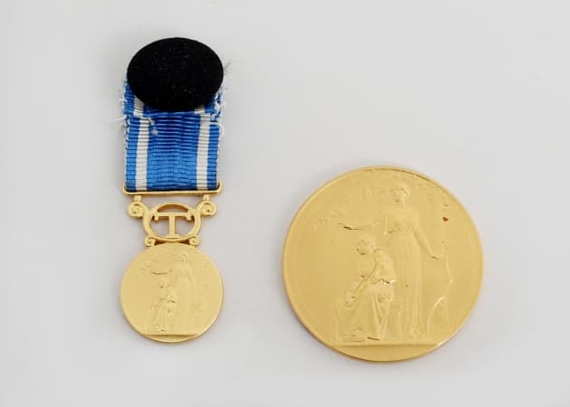 Guldmedaljer 2 stycken 18k