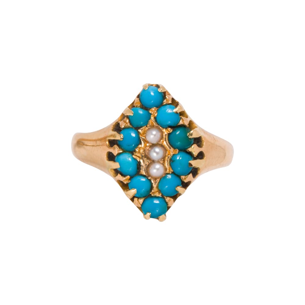 An antique turquoise, seed pearl, and 22k gold ring