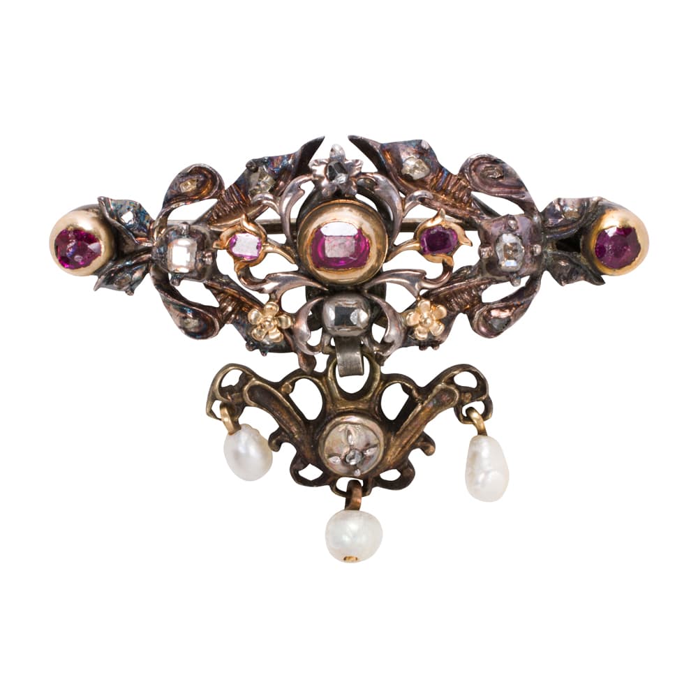 An Austro-Hungarian cultured pearl, paste, enamel, and gilt silver locket