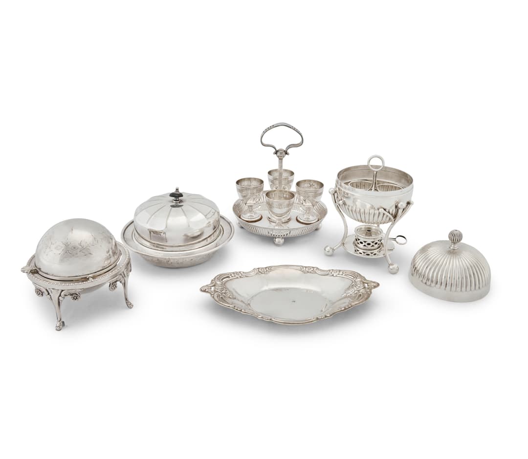 A selection of silver plated and white metal serving and dining items
