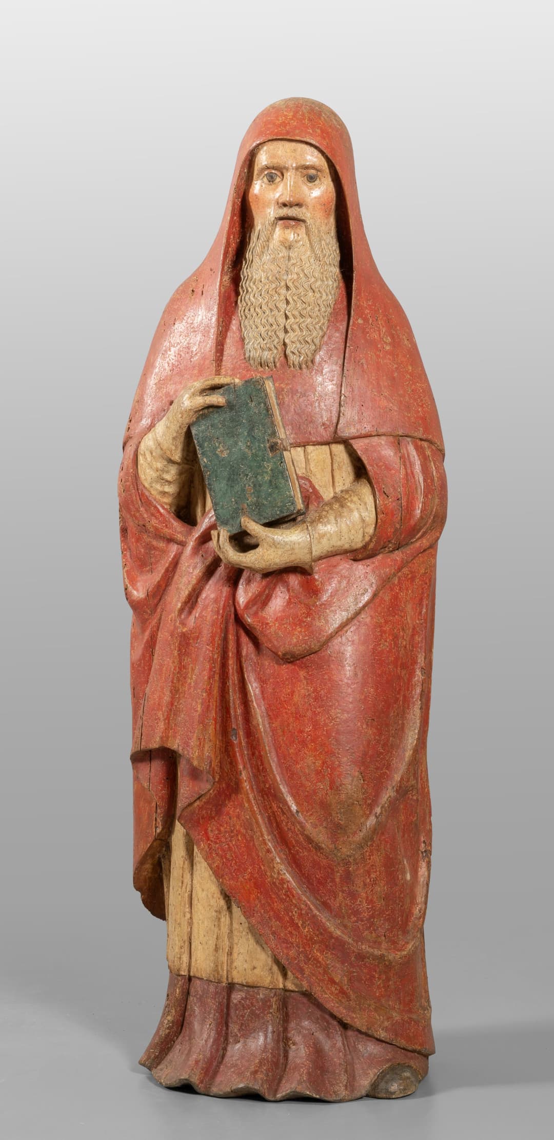 Scuola lombarda sec.XIV, Vescovo con barba e libro, scultura in legno