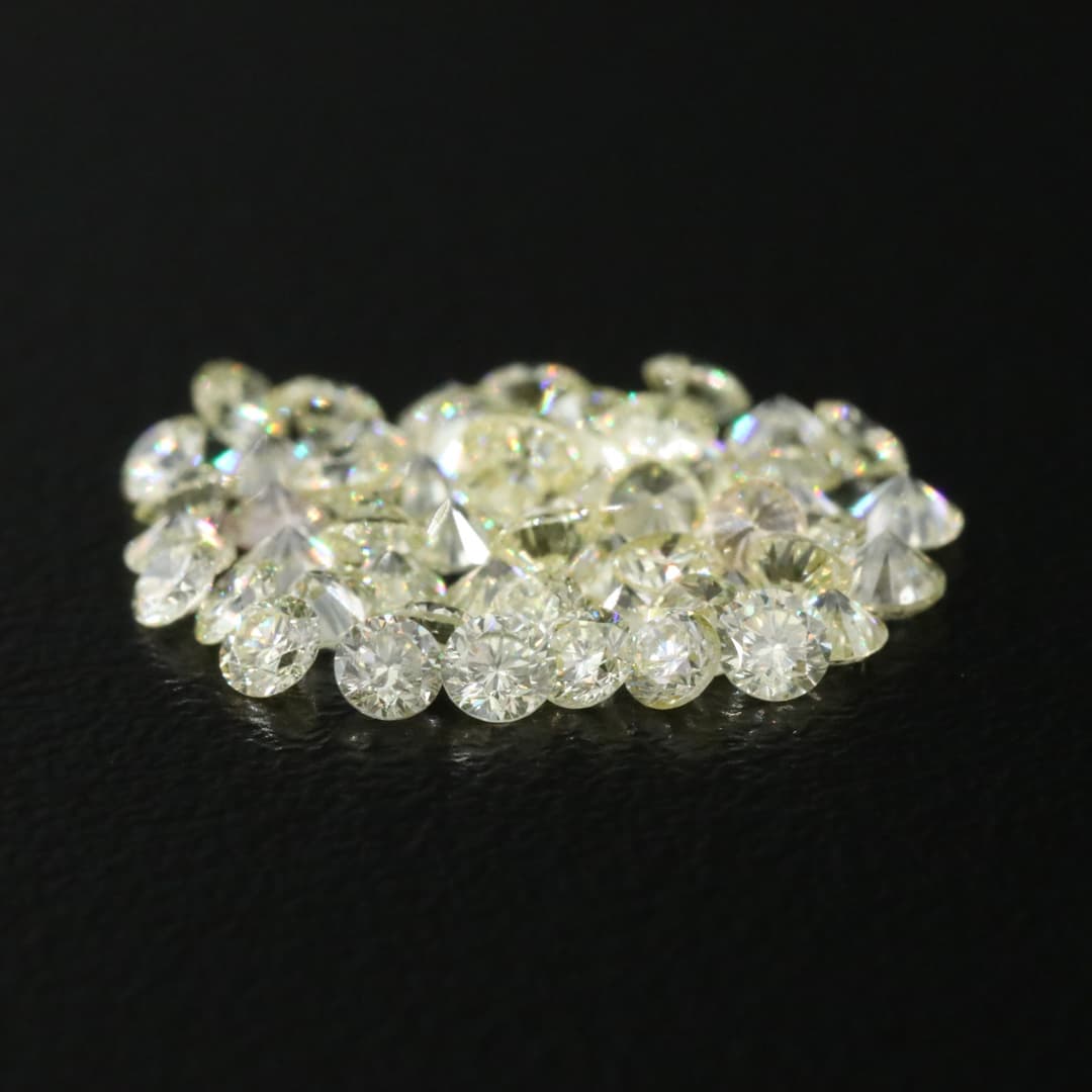 Loose 2.43 CTW Diamond Lot Including Fancy Yellow