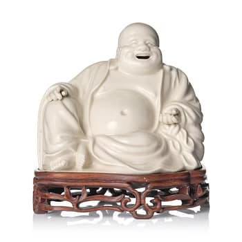 A blanc de chine figure of Budai, Qing dynasty, 18/19th century.