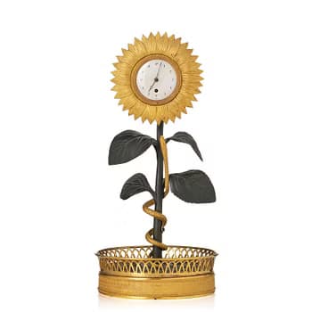 A French Empire ormolu and patinated bronze mantel clock, first part