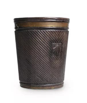 A LARGE CARVED MAHOGANY AND BRASS BOUND PEAT BUCKET, IN GEORGE III
