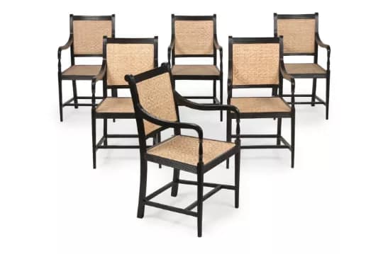 Y A SET OF SIX EBONY ARMCHAIRS, IN GEORGE III STYLE, LATE 20TH OR
