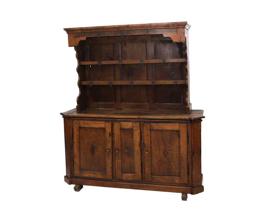An oak sideboard with plate rack, England, 18th century