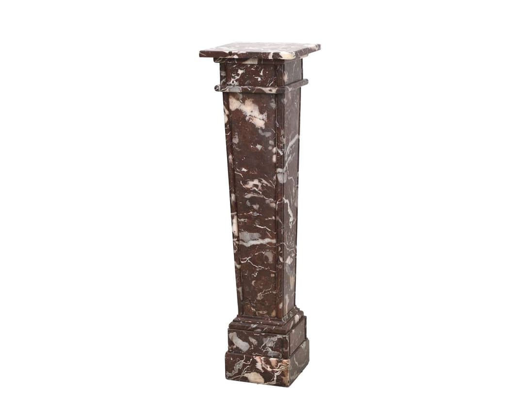 A red marble pedestal, c. 1900