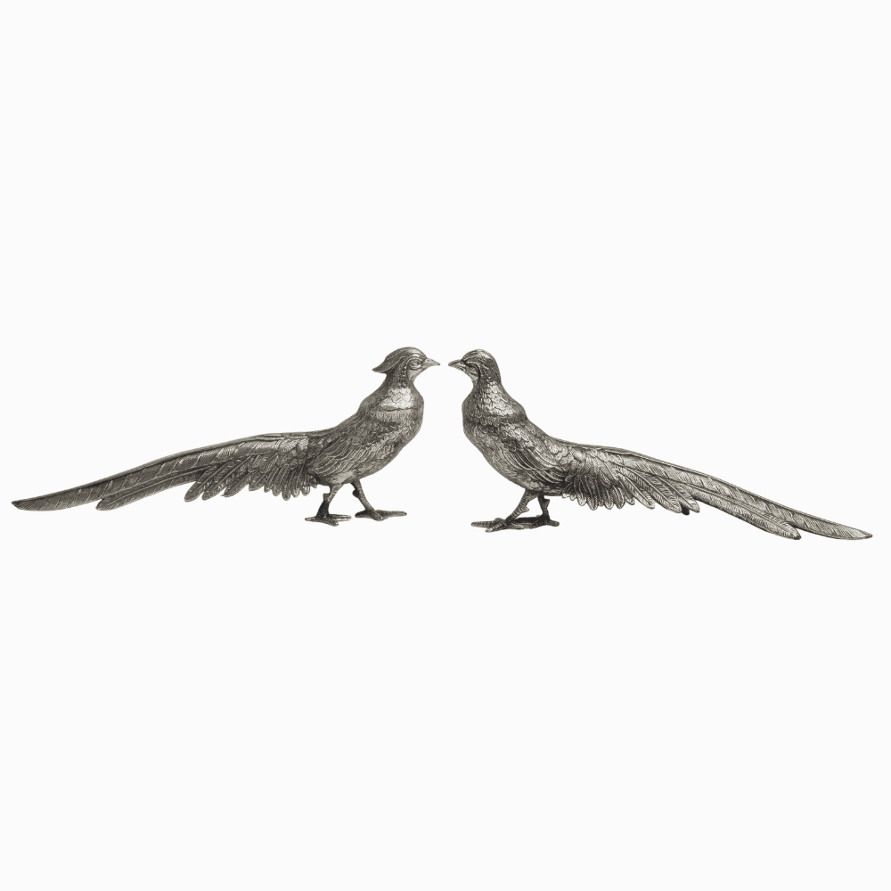 Dos faisanes en plata española punzonada.