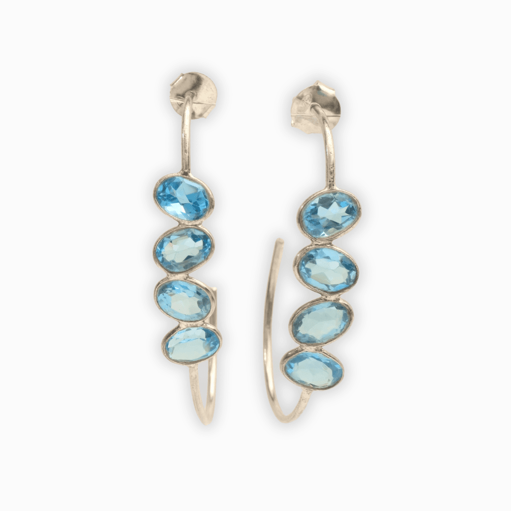 Pendientes en plata con topacio azul.