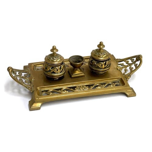 A Victorian brass inkstand, having two pierced sections for ...