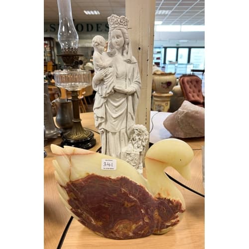 A large carved onyx duck figure and a white painted plaster ...