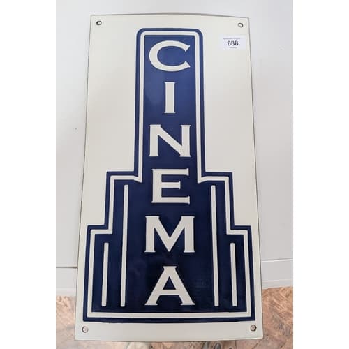 A vintage style cinema enamel wall sign