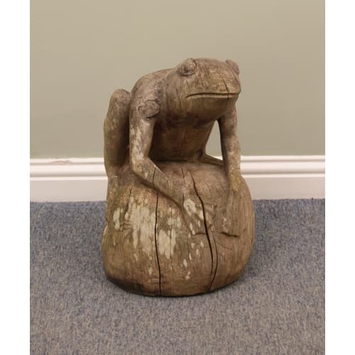 A carved pine ornamental frog figure, 53 cm high