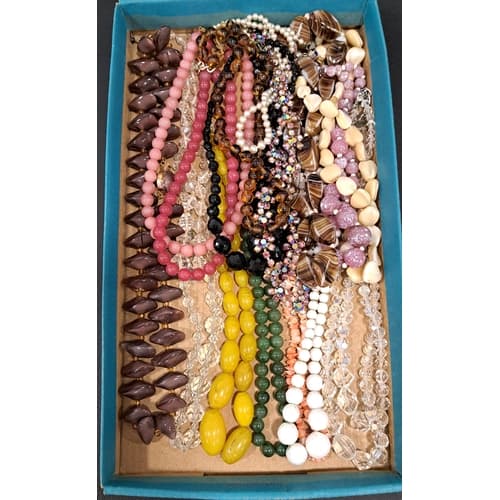 SEVENTEEN VINTAGE BEAD NECKLACES including crystal, amber ef...