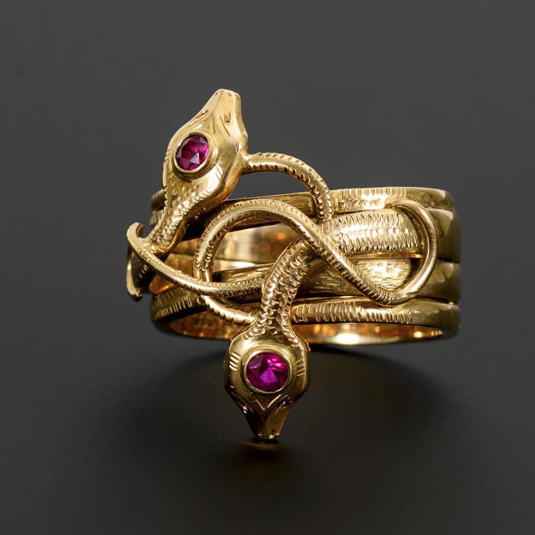 Exceptionally large ring in the shape of two snakes.