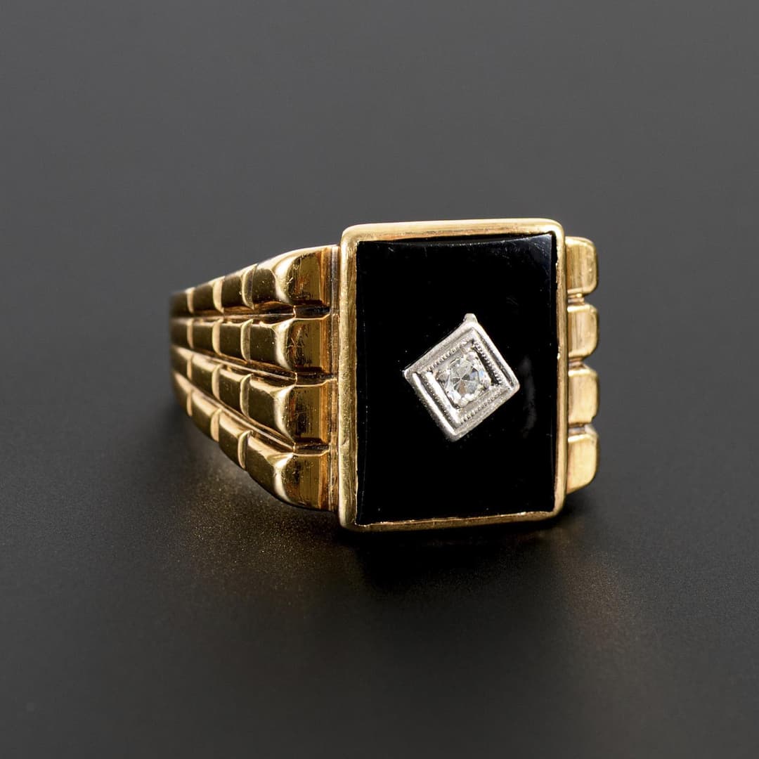 Large ring with onyx and diamond.