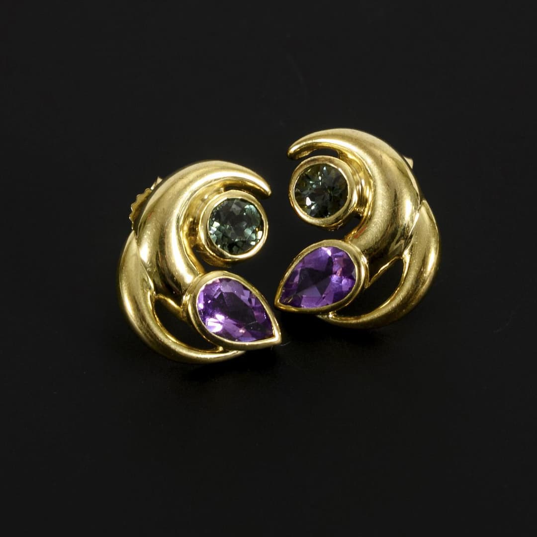 Ear studs with two different colored stones.