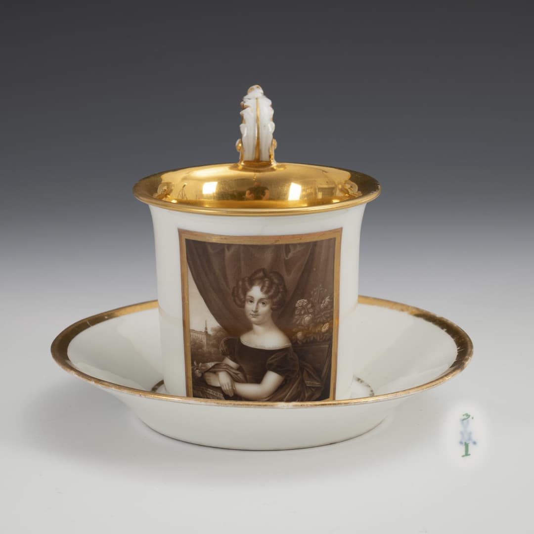 Vitrine cup with portrait of a woman. Meissen.