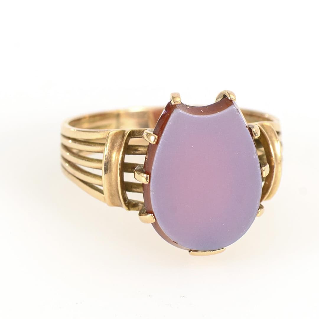Uncut signet ring.
