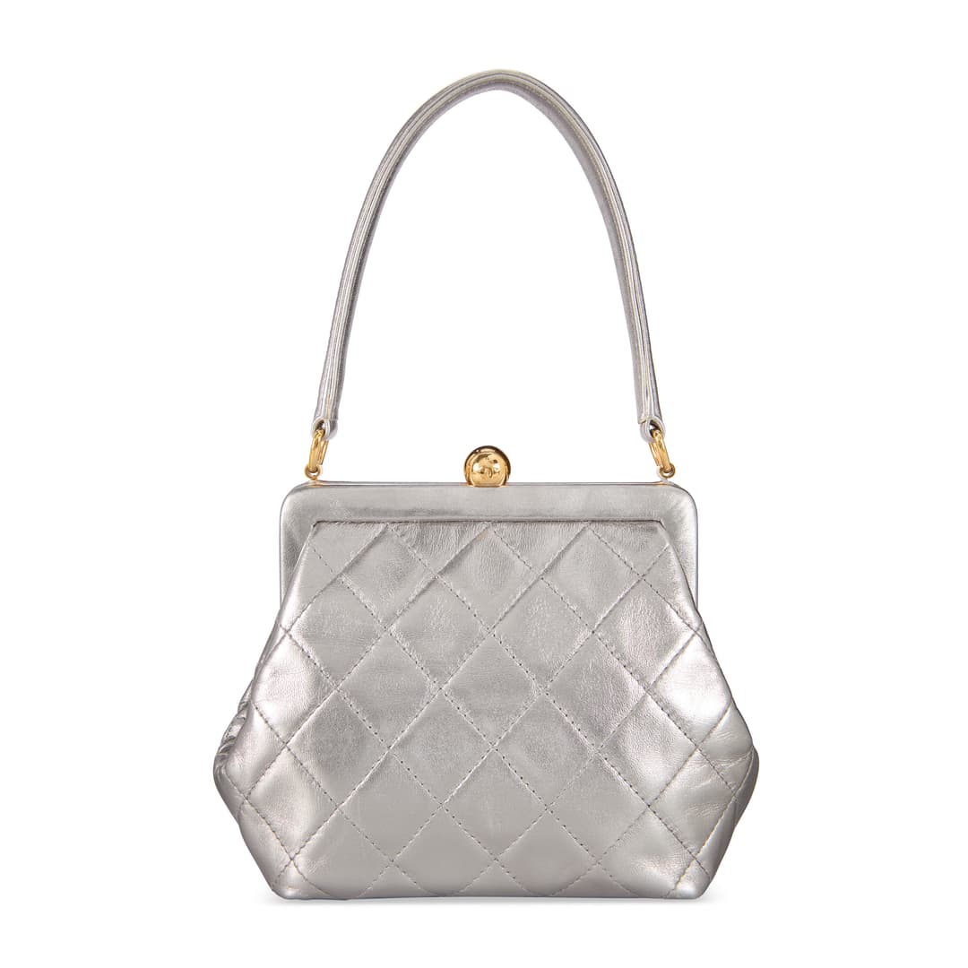 A Metallic Silver Quilted Lambskin Leather Frame Bag with Gold Hardware