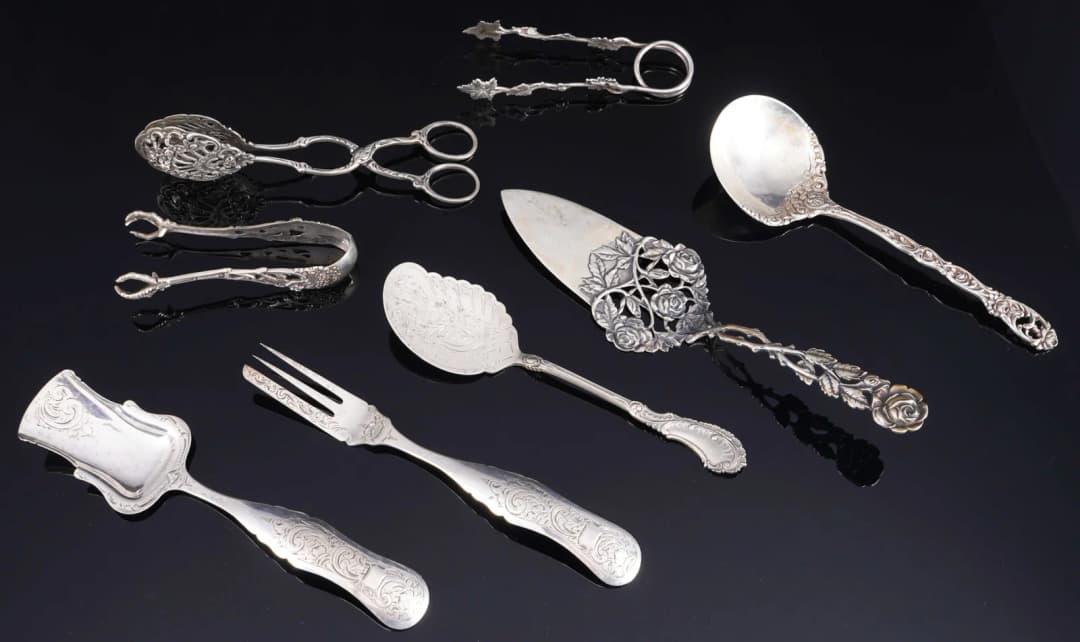 800-833 silver, 8-piece cutlery set - including pieces by J.M. van
