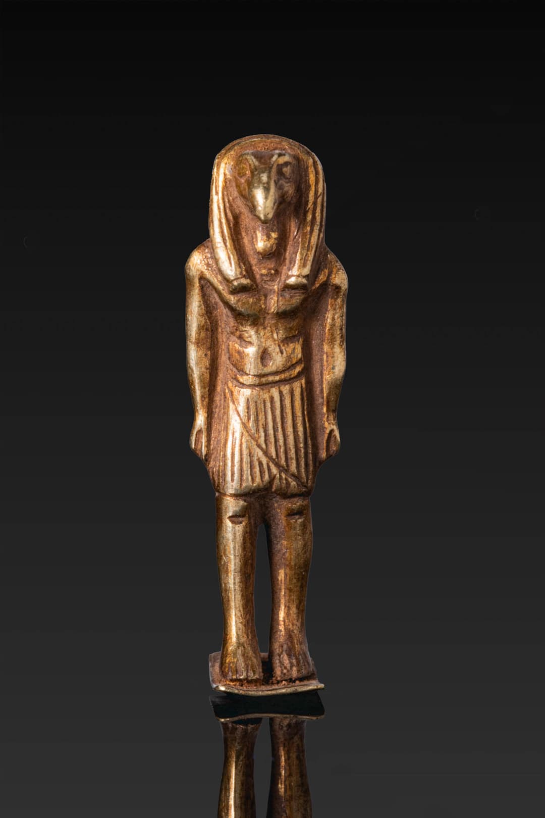 EGYPTIAN-PHOENICIAN GOLD AMULET OF A BIRD GOD (PROBABLY THOTH)