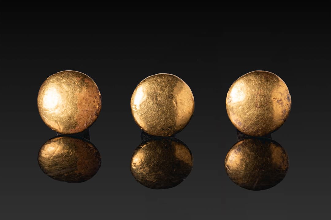 RARE COLLECTION OF EGYPTIAN GOLD AND BRONZE MUMMY EAR PLUGS