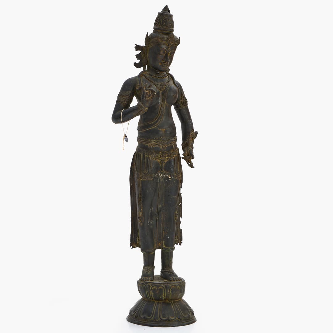 DEWI SRI, Indonesien/Bali. stående på lotusbas, Kopparlegering. 1900-tal.