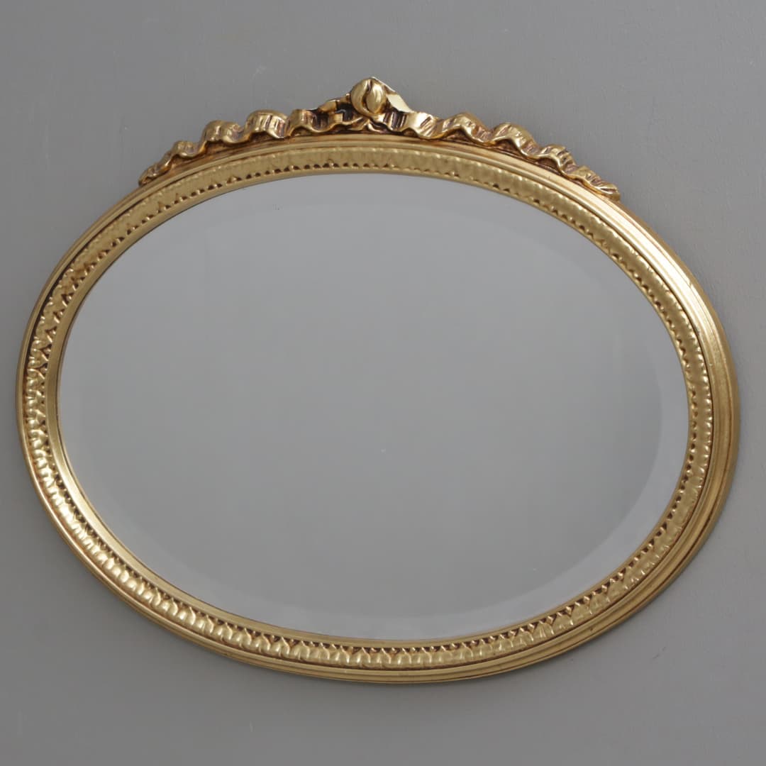 SPEGEL, guldmålad ram, oval.