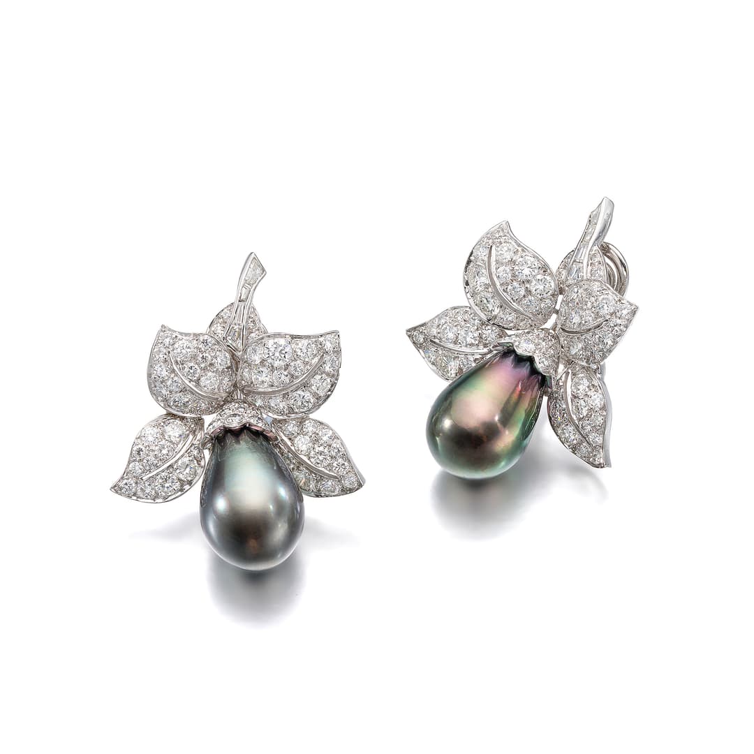A Pair of South Sea Cultured Pearl, Diamond and Platinum Ear Clips