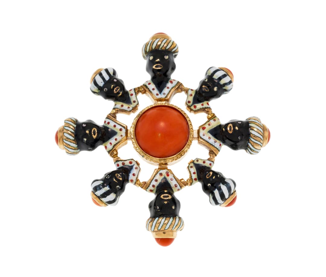 Broche Blackamoor début XXe s., or 585 formant une rosace ornée d'émail